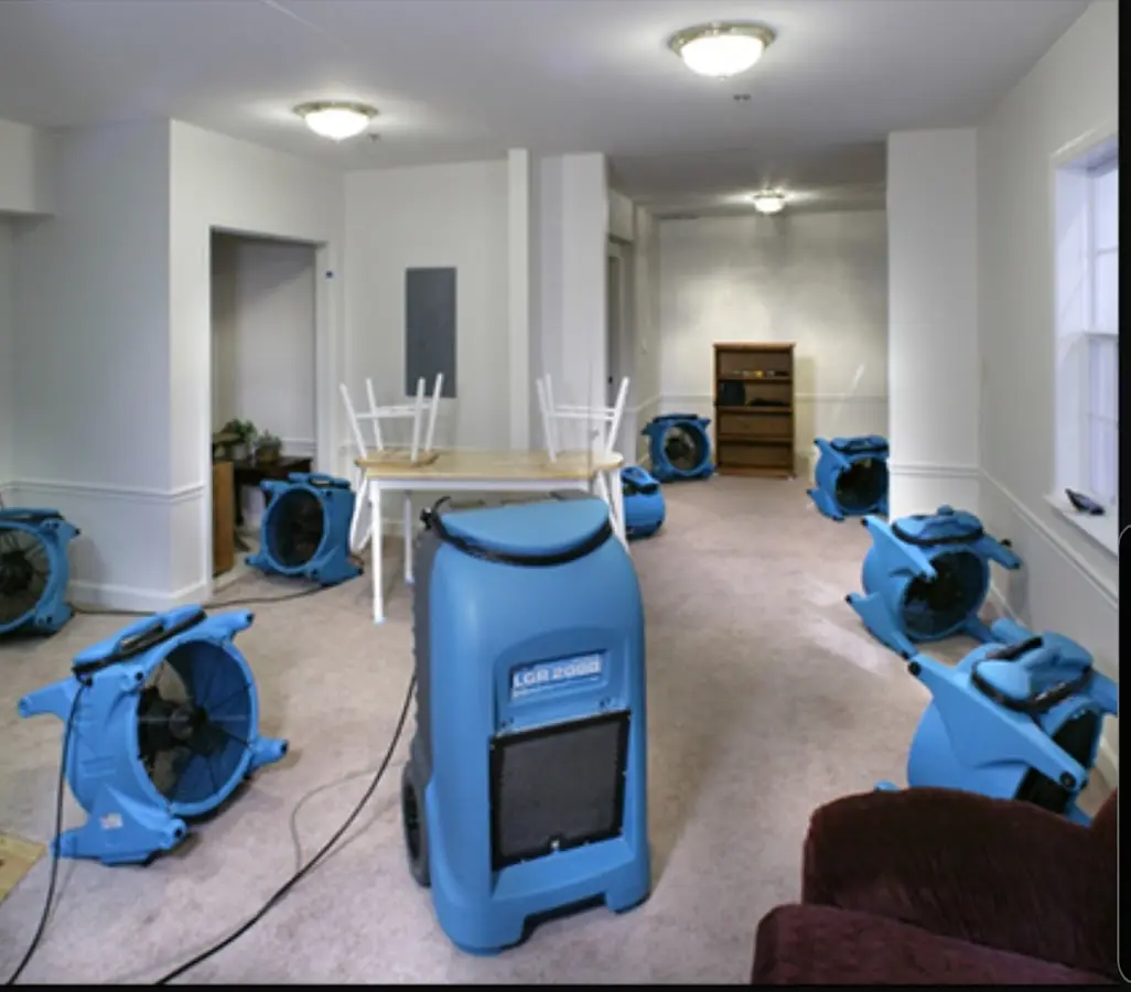 Air movers and dehumidifier setup for Water Damage Restoration in Ripon